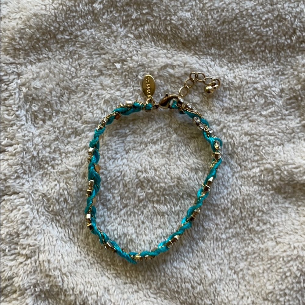 Express turquoise and gold color twined bracelet